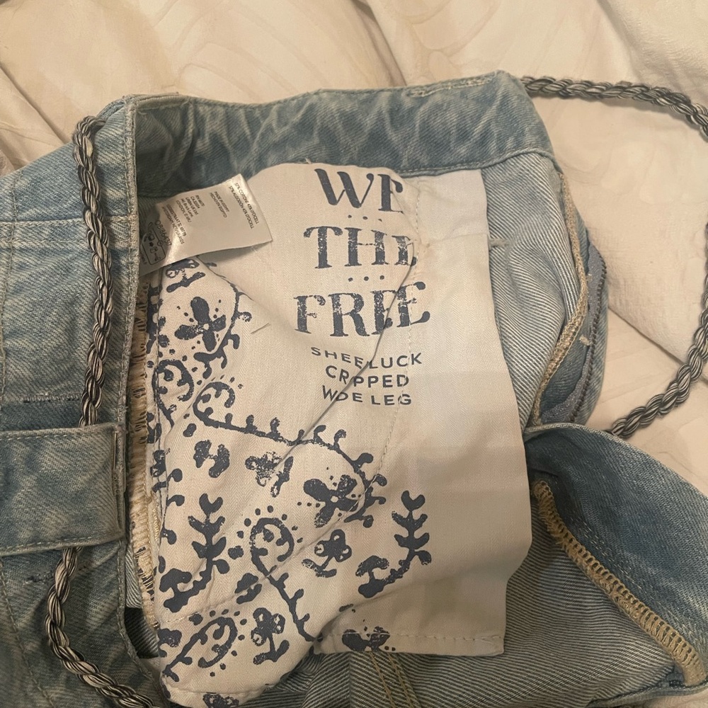 We The Free Blue Ankle Cropped Jeans with Decorative Patch